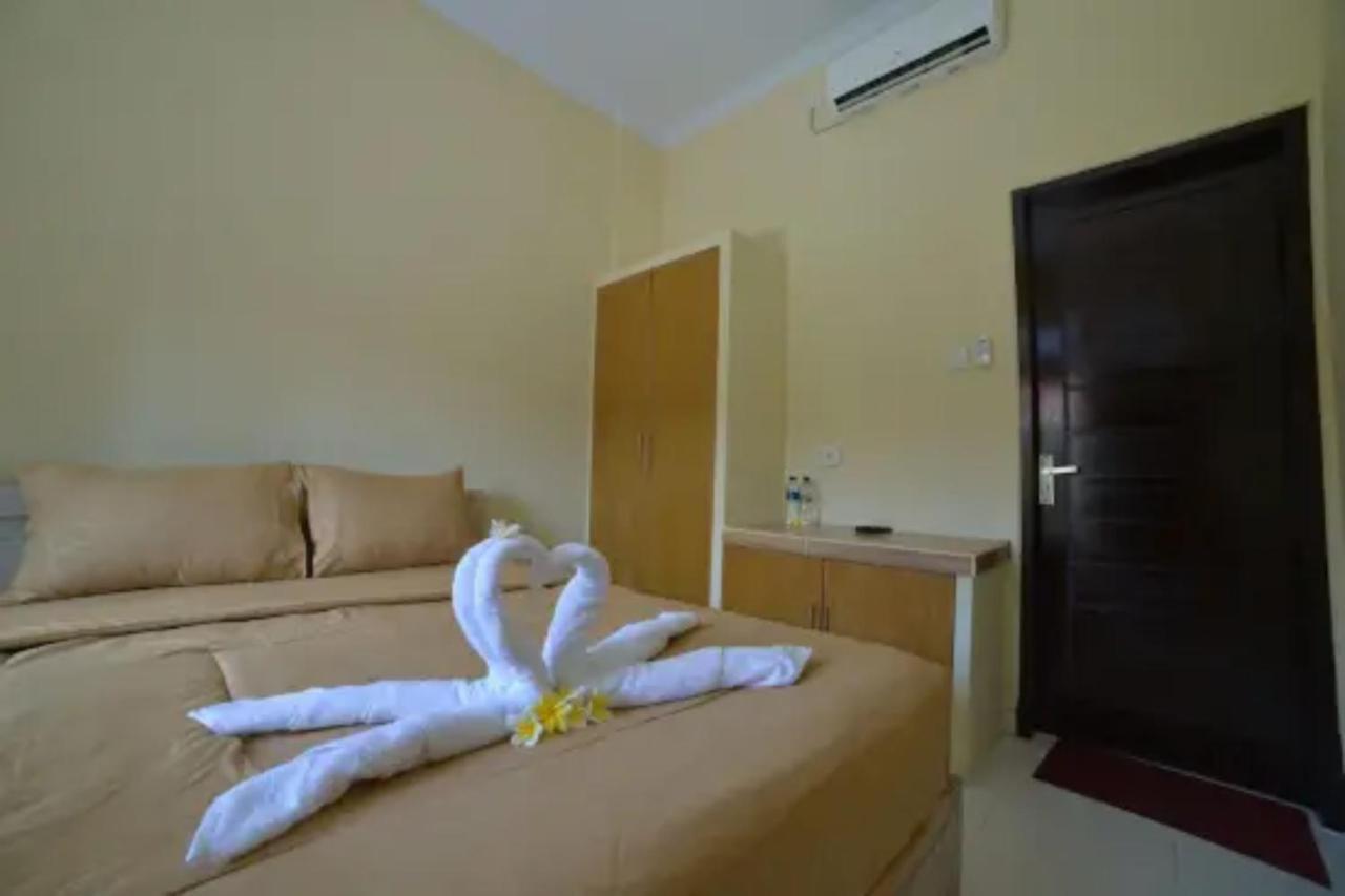 Oyo Flagship 91237 Ratu Guest House Kedunganan Экстерьер фото